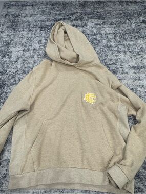 Eric Emanuel Beige Crewneck Hoodie with Yellow Crest